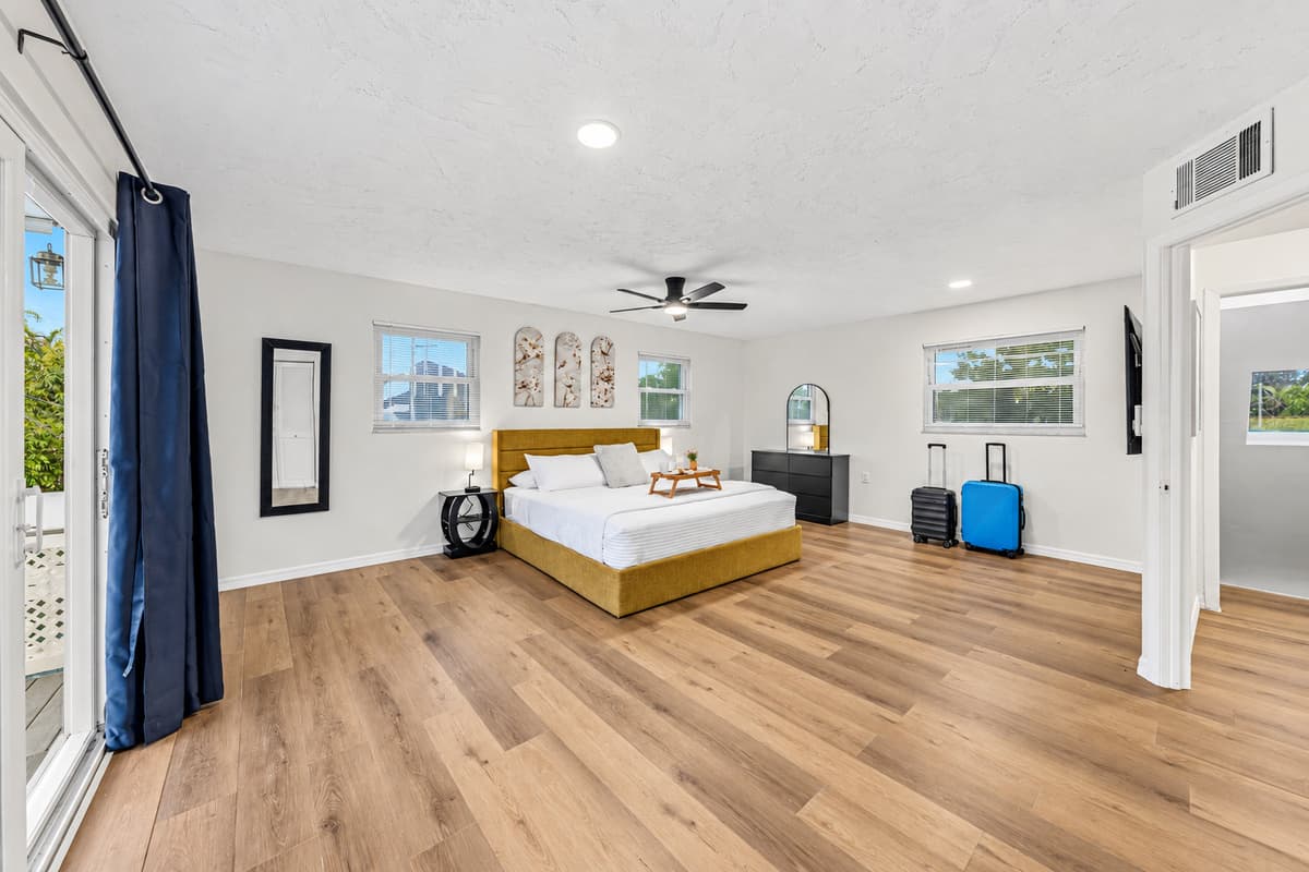 Expansive bedroom retreat with a king bed, open layout, and plenty of space to unwind comfortably 