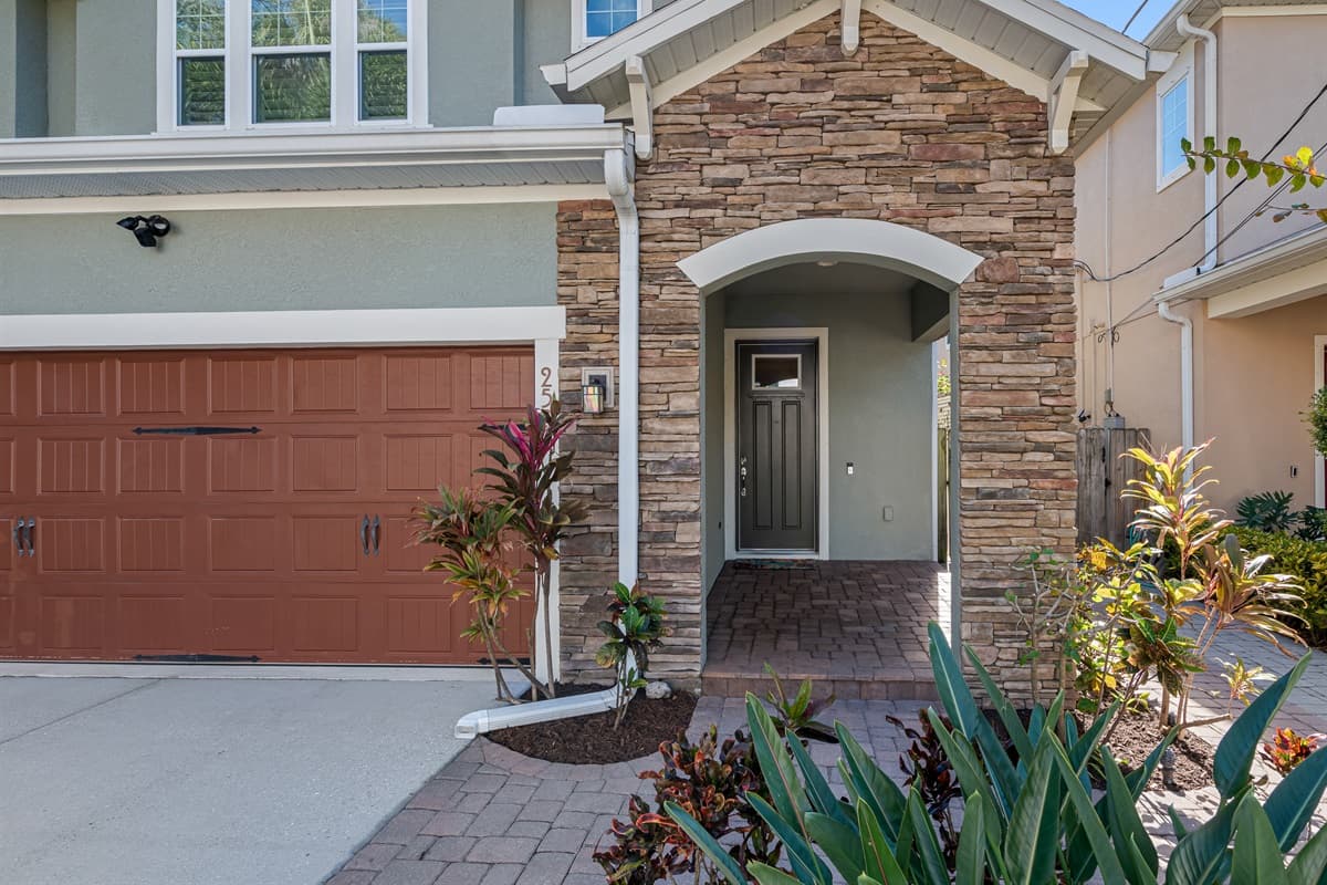 Stunning front view of the house showcasing the front yard and parking area. If you are interested in this property, send us an inquiry now!
