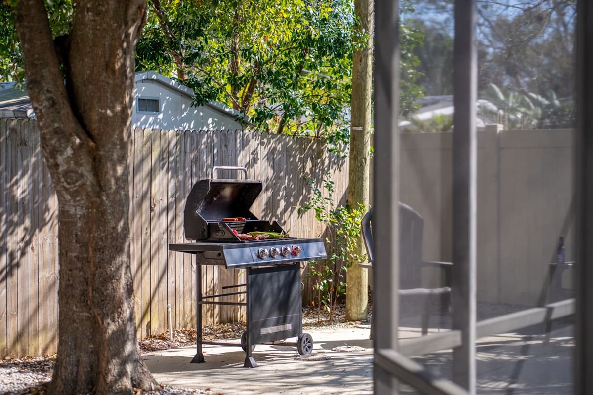 Enhance your outdoor experience with a fully equipped grill station, making poolside gatherings even more enjoyable.