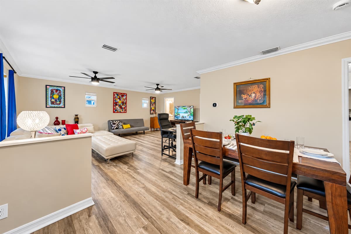 Open-concept layout connecting dining and living spaces for seamless entertaining.