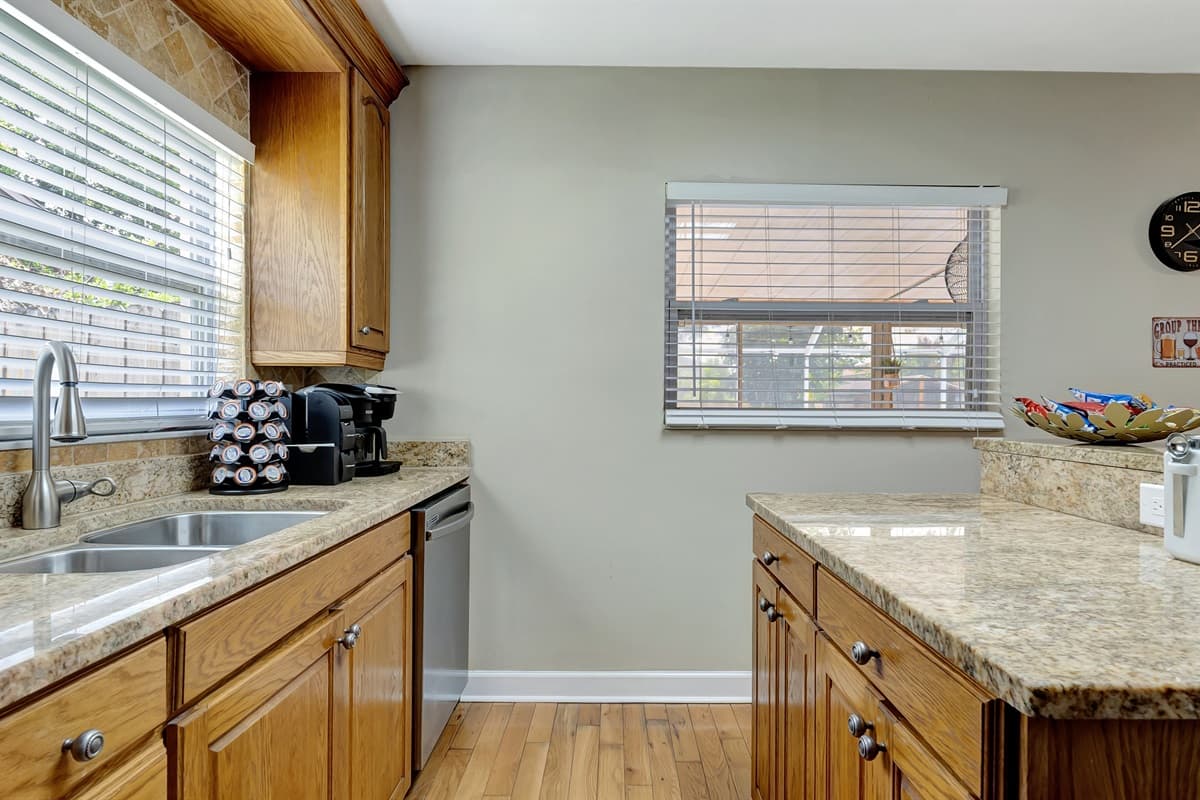 Picture yourself starting your day with a cup of coffee and a delicious meal in this intimate setting, bathed in the soft morning light.