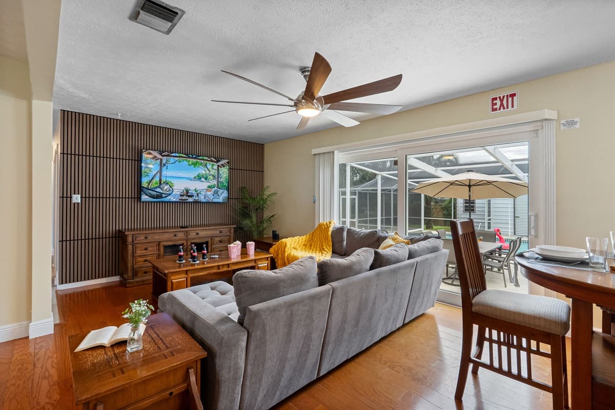 Relax in this thoughtfully designed living room with stylish accents and plenty of seating.