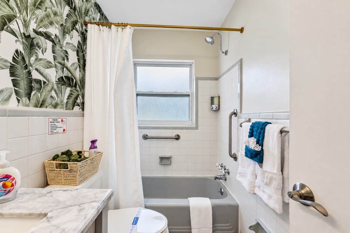 The striking design of this space, create a sense of being immersed in a verdant jungle or a secluded island retreat.