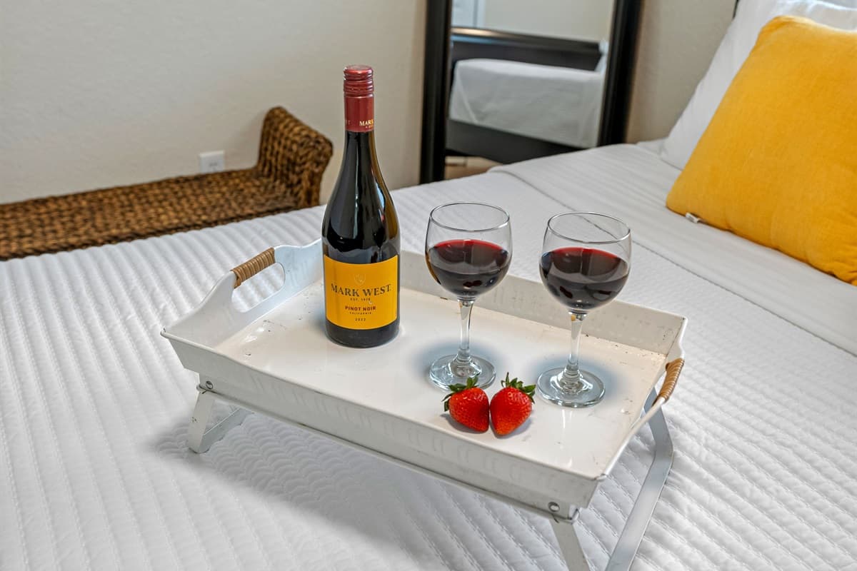 The overall look is minimalist yet warm, perfect for travelers who value a clean, uncluttered space.