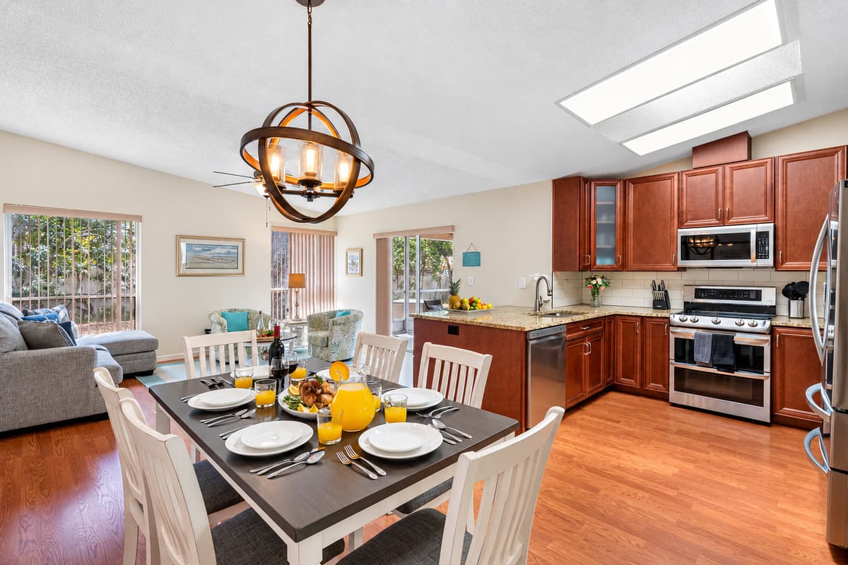 Featuring a comprehensive array of modern appliances, essential cookware, and versatile utensils that facilitate the preparation of a wide range of home-cooked meals.