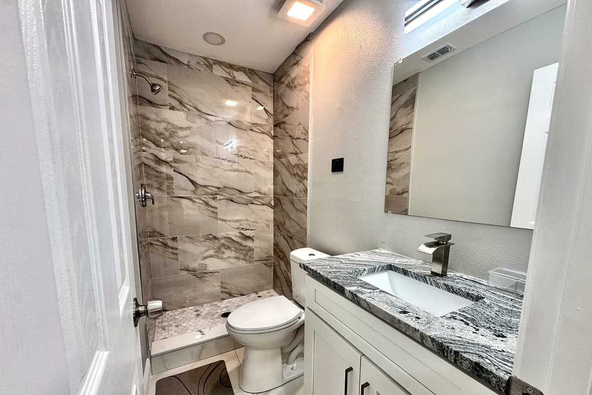 The second bathroom is thoughtfully designed to provide both comfort and convenience, making it ideal for shared use among guests.