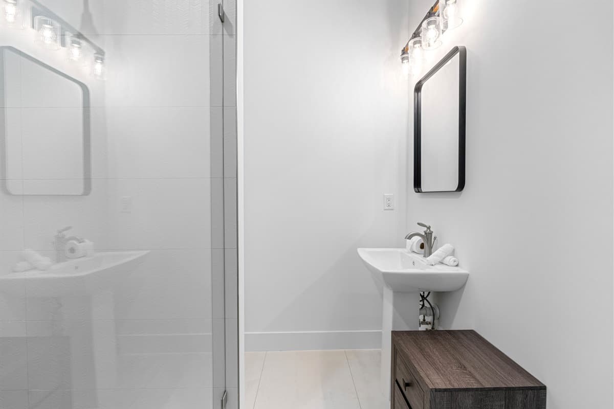 Every detail in the bathroom has been meticulously chosen to offer both style and functionality.