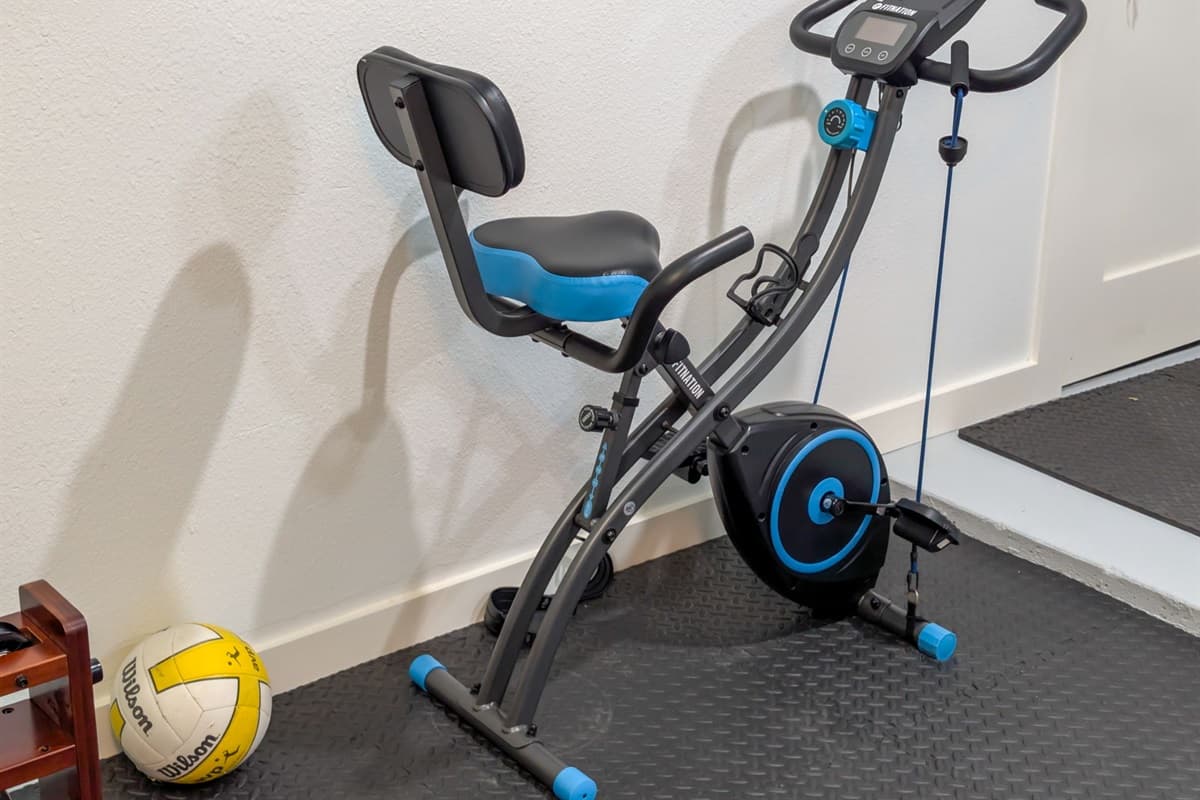 Play, relax, or break a sweat! This fully equipped recreation area includes games, fitness gear, and laundry essentials for a complete home experience.