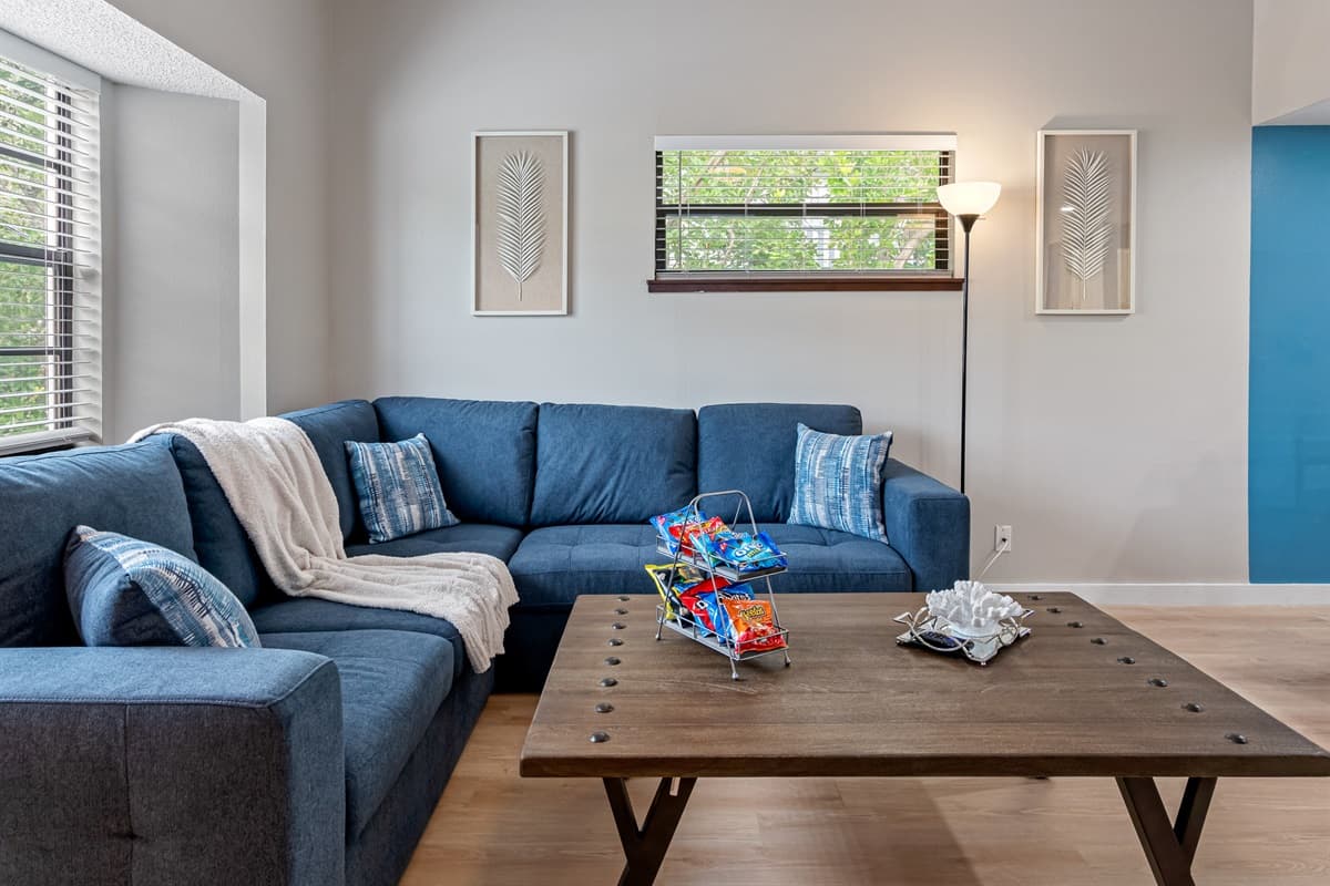 With its contemporary design and vibrant blue hue, it adds a pop of personality to any living space.
