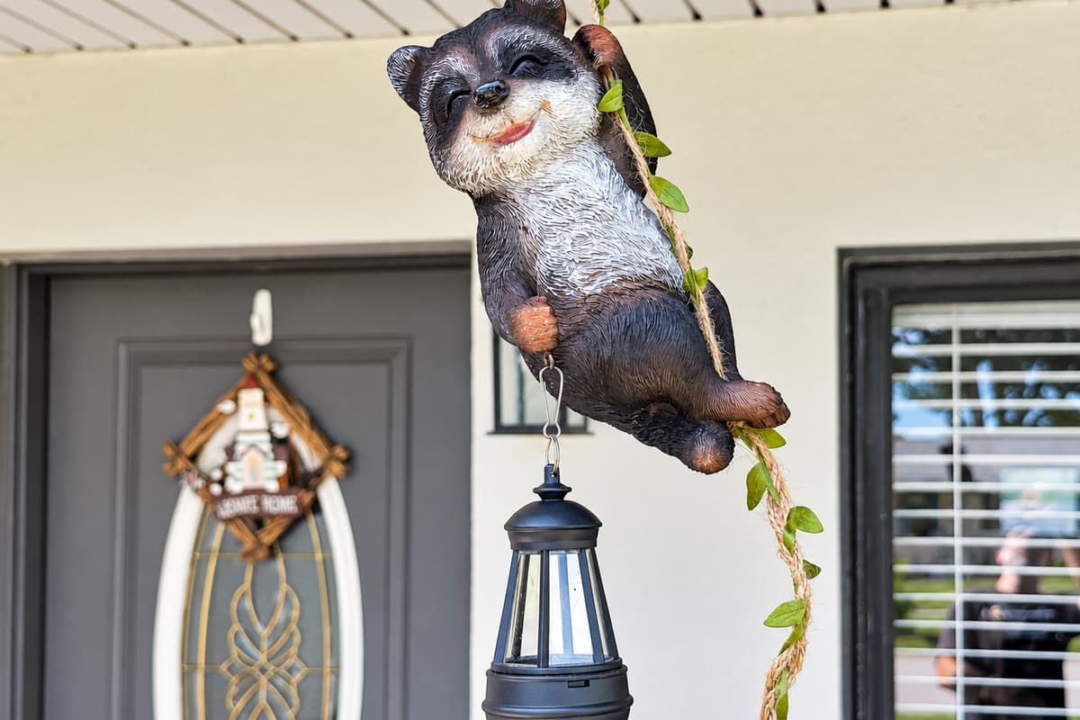 Meet the smallest member of the household. This little raccoon has been hanging by the front door since long before you booked, quietly greeting every guest who walks up the path. Kids spot him first, every single time.