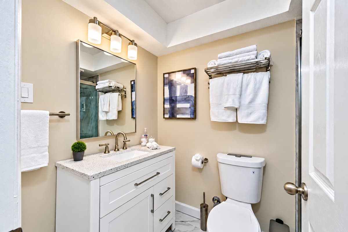 Beautiful bathroom equipped with sink, toilet, and shower. Enjoy a relaxing bath after a long day of travel from your home to your home away from home. If you think this property is for you, send us an inquiry right away!