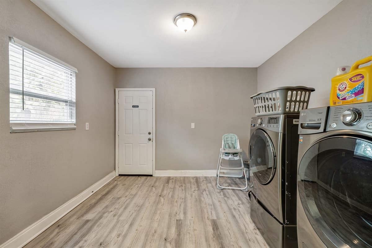 Modern appliances stand tall, ready to tackle the demands of daily laundry.