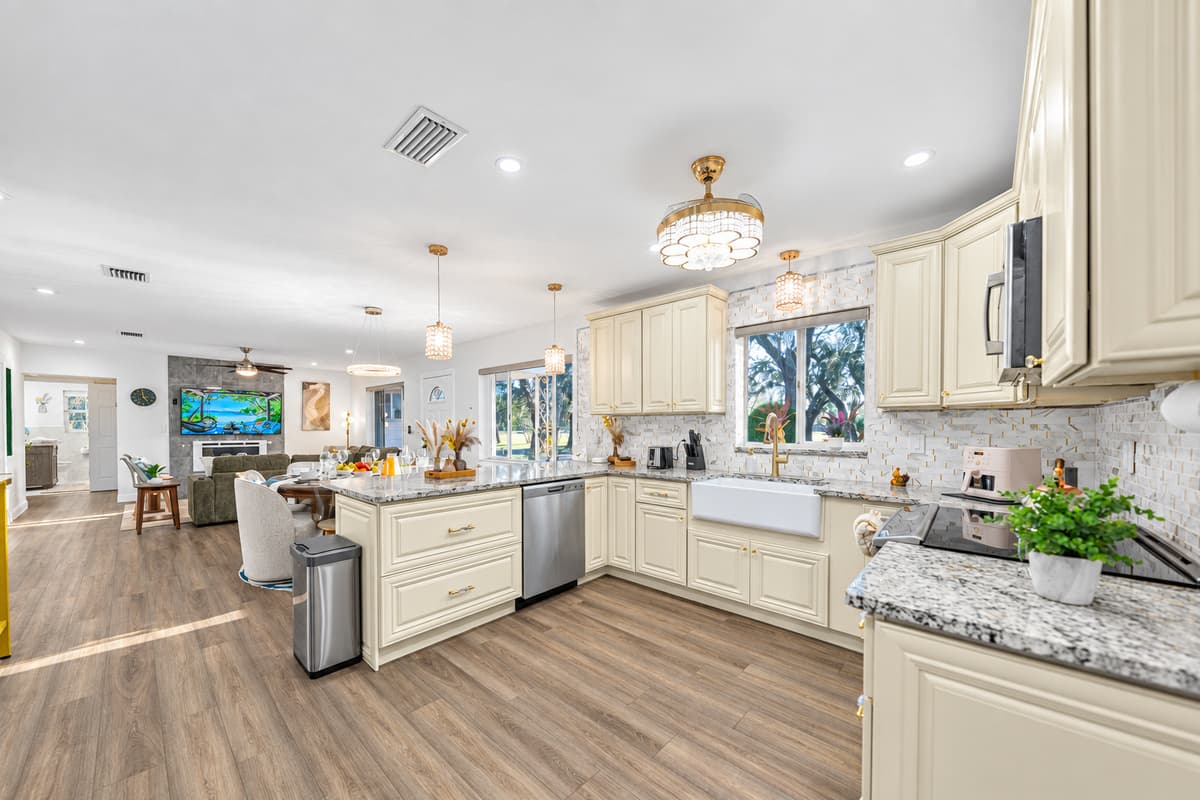 Designed for both beauty and function, this kitchen offers plenty of space to prepare meals while staying connected to the rest of the home.