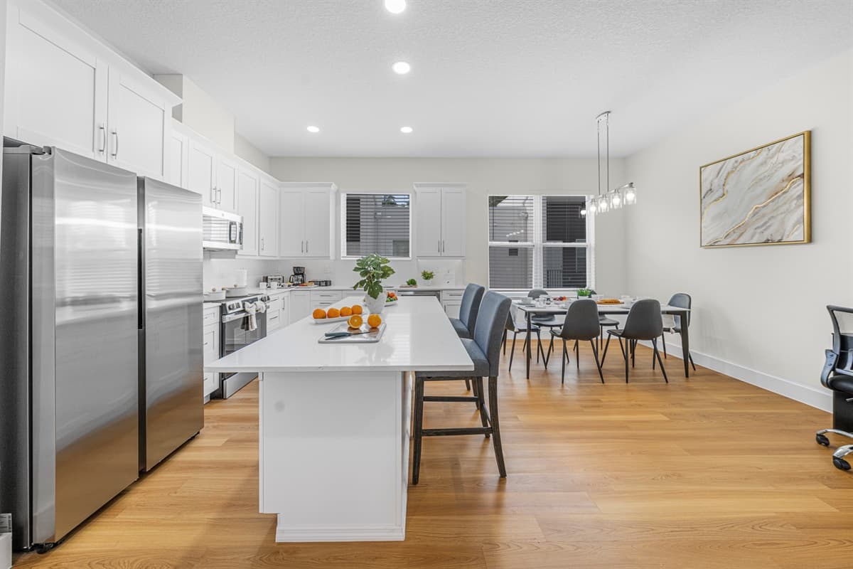 Expansive kitchen and dining area with large island and open layout—perfect for entertaining.