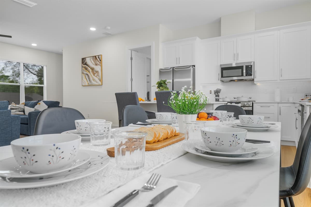 From the dining table you can see the entire open layout. Chat with the chef, watch the game, or just enjoy the vibe.