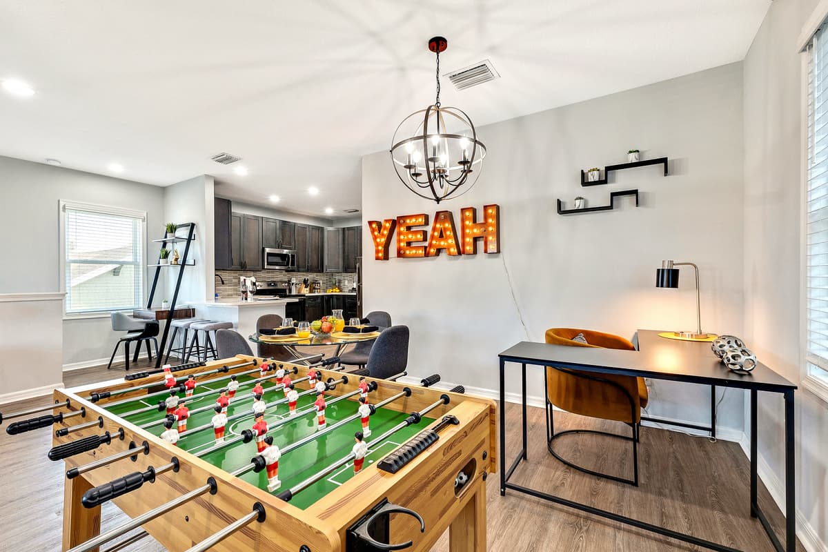 A timeless foosball table awaits, inviting you to indulge in the excitement of play and the camaraderie of friendly competition.