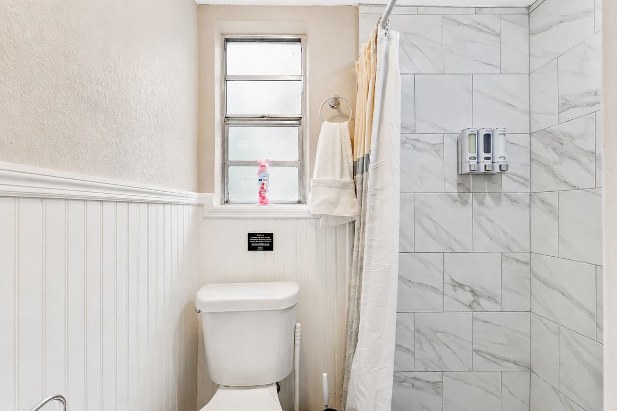 Immerse yourself in the invigorating cascade of the shower.