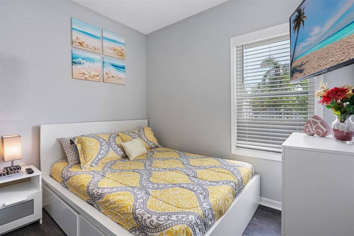 Lovely bedroom with a comfortable huge bed and a single bunkbed. This room also has its own TV. Feel at home in your home away from home.