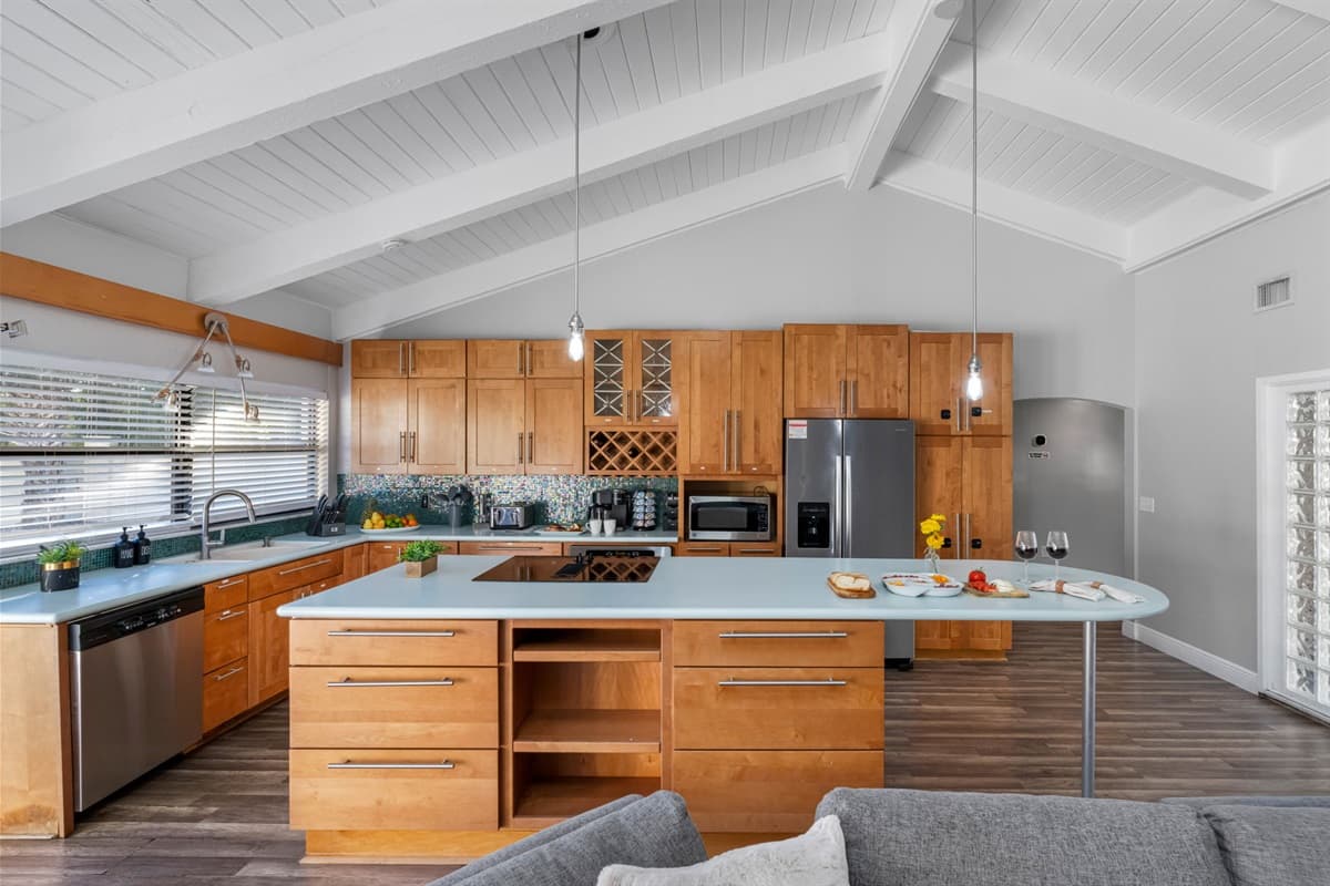 With its large island, open layout, and easy flow to the living area, this kitchen is perfect for gatherings.