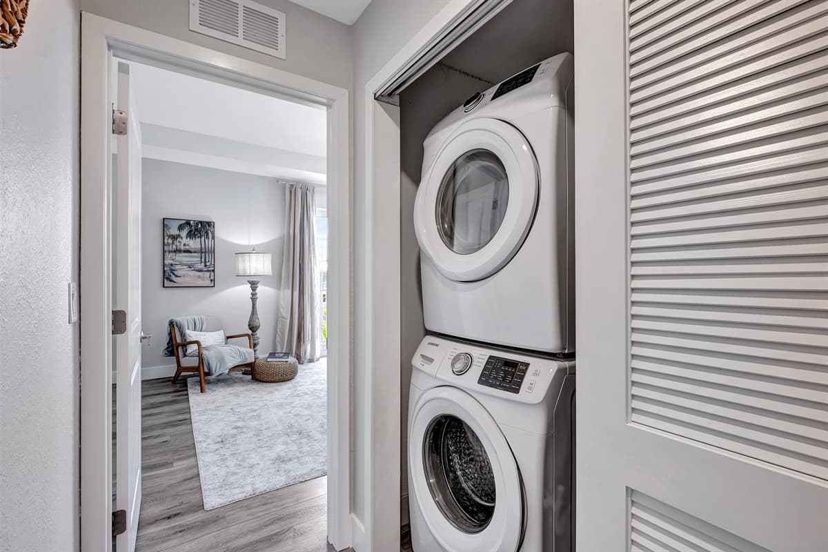 Equipped with state-of-the-art washing and drying appliances, this area streamlines the chore of laundry. 