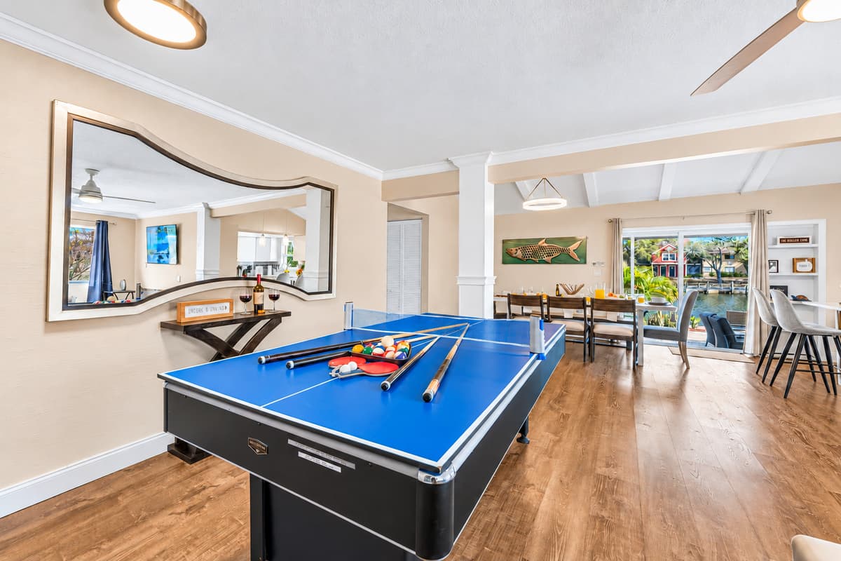 Game room with pool table overlooking the dining area—great for entertaining all ages.