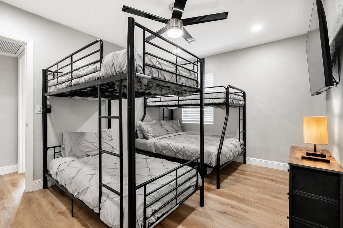 New setup for this bedroom: 1 queen bed and 1 bunk bed (twin over twin). New photos coming soon!