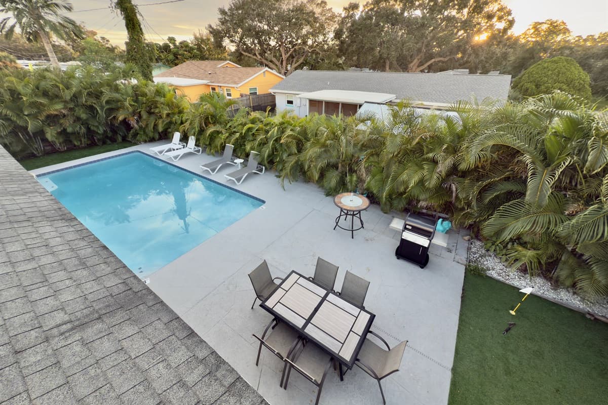 This home’s outdoor living area offers resort-style amenities with the comfort of privacy.