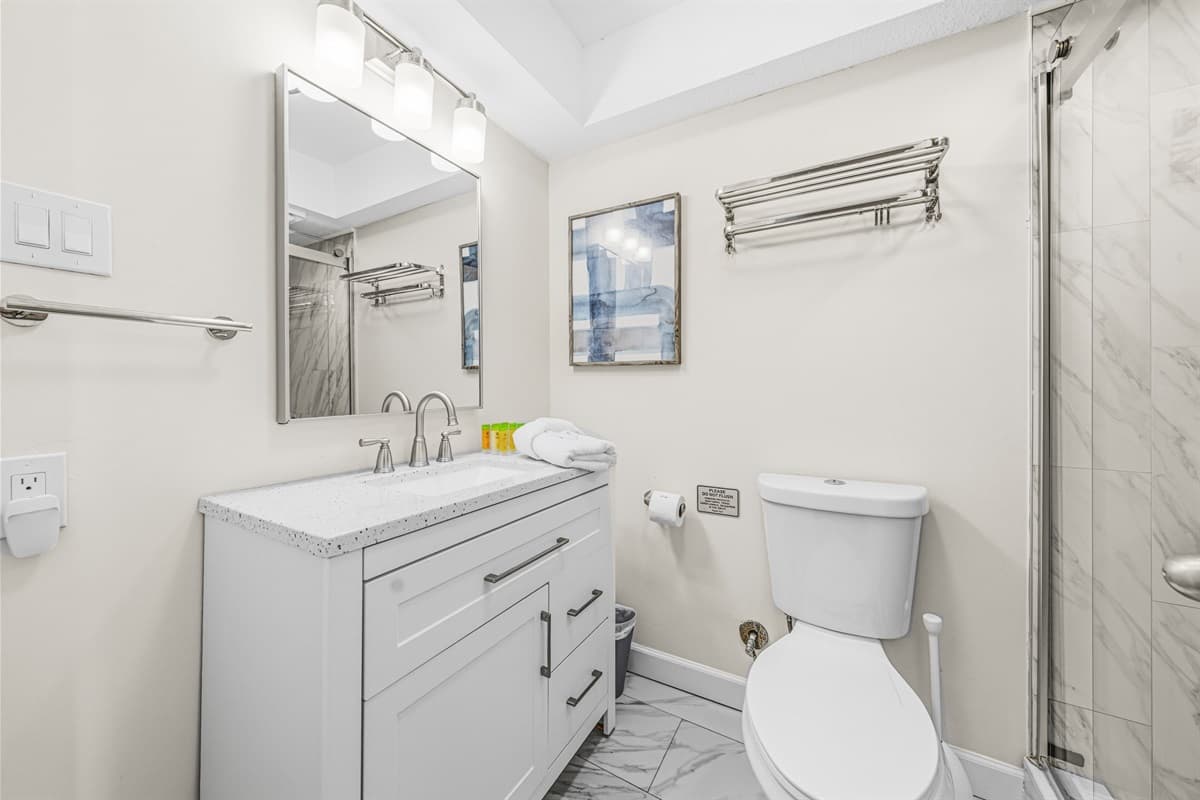 Fresh and stylish full bathroom stocked with essentials for your stay.