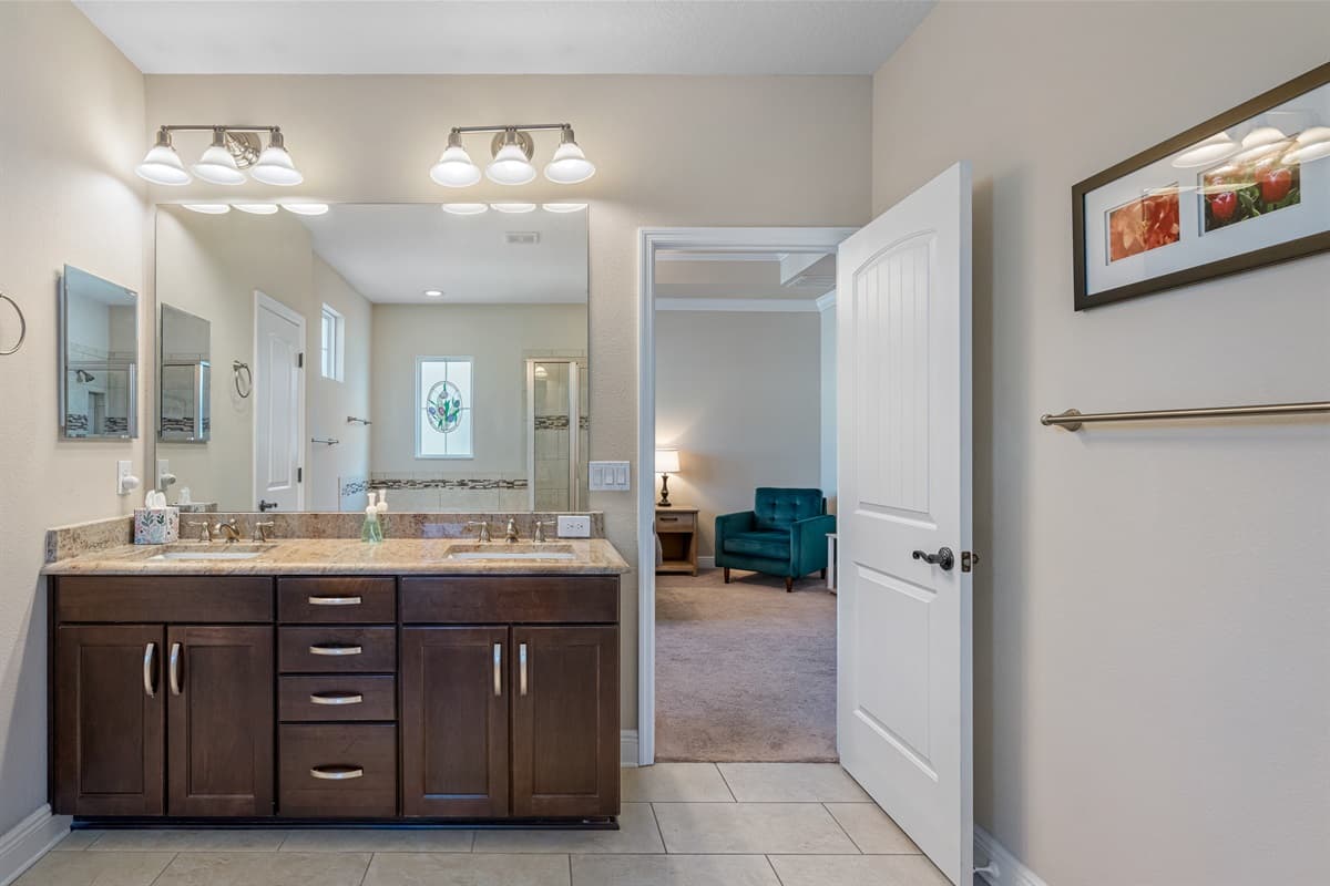 Beautiful bathroom equipped with bathtub, lovely vanity and sink, toilet and shower. Enjoy a relaxing bath after a long day of travel from your home to your home away from home. If you think this property if for you, send us an inquiry right away!