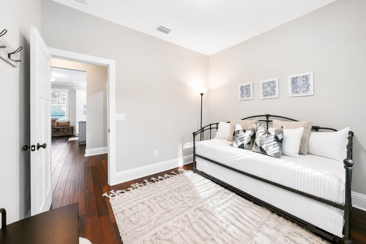 A comfortable twin daybed provides extra sleeping space while offering a cozy spot to read or unwind.