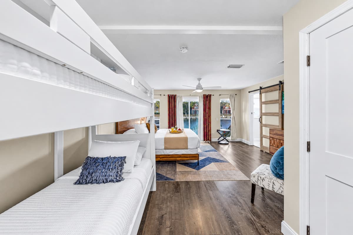 Twin-over-twin bunk beds provide additional sleeping space for children or extra guests.