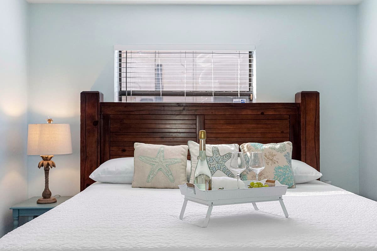 Thoughtfully furnished, the room includes nightstands with soft lighting, a dresser for ample storage, and a spacious closet to accommodate your belongings.