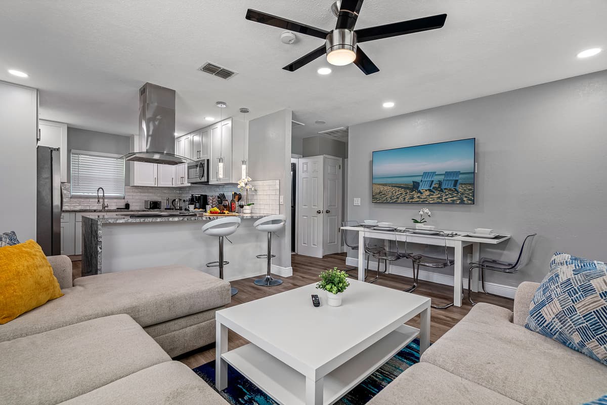 Feel relaxed and comfortable while bonding with family in our beautiful living room with L-shaped modern couch and smart TV.