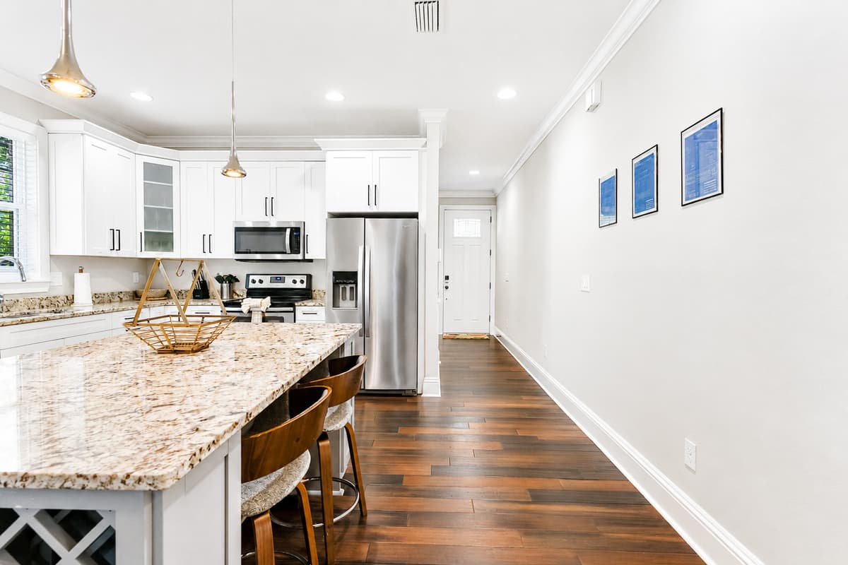 The spacious open floor plan makes it easy to cook, dine, and spend quality time together.