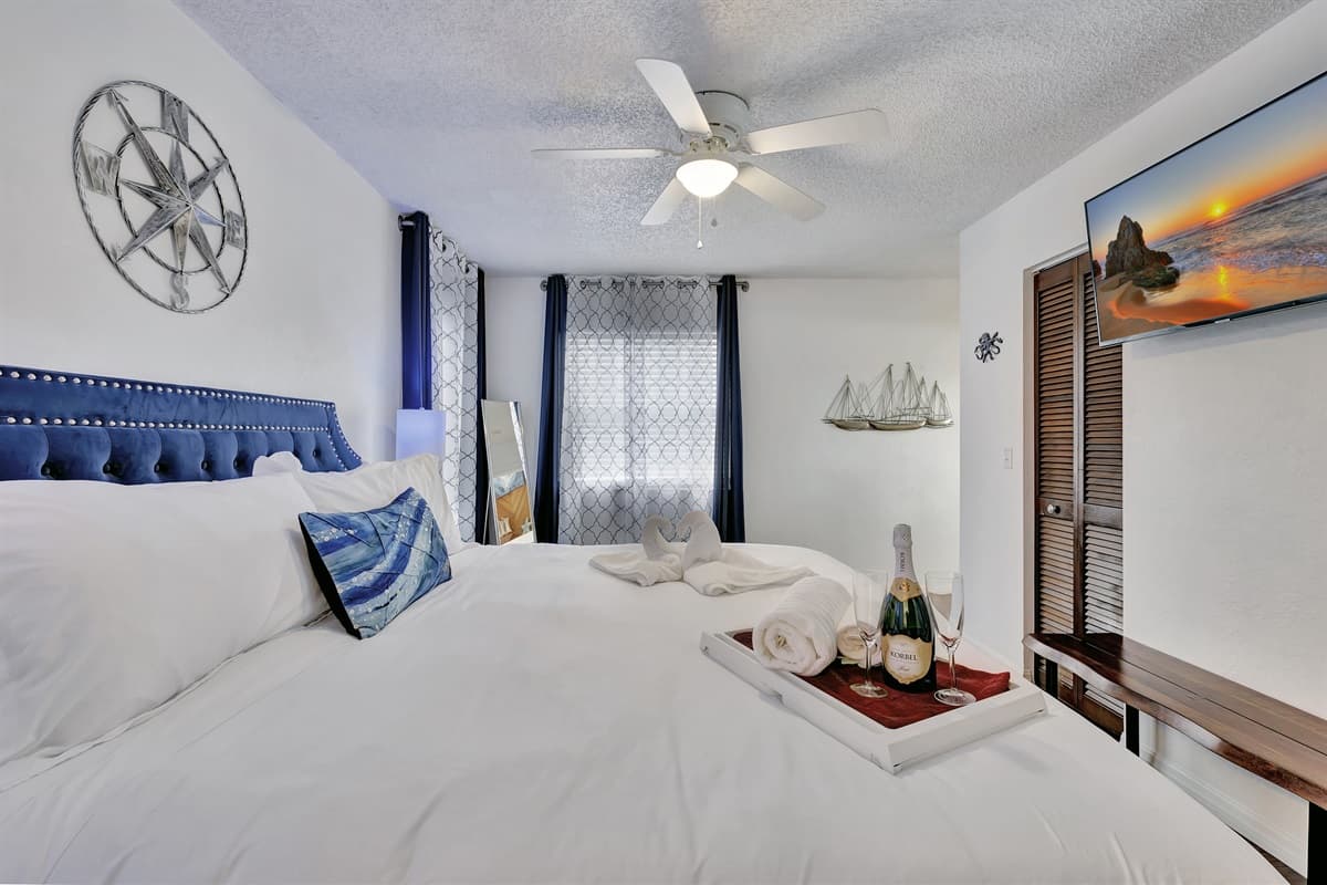 At the heart of this bedroom is a lavish king-size bed, inviting you to indulge in unparalleled comfort.