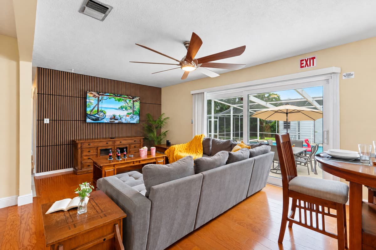 Relax in this thoughtfully designed living room with stylish accents and plenty of seating.