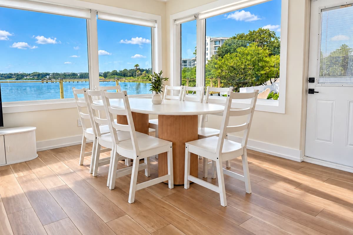 Indoor dining area beside the waterfront windows.