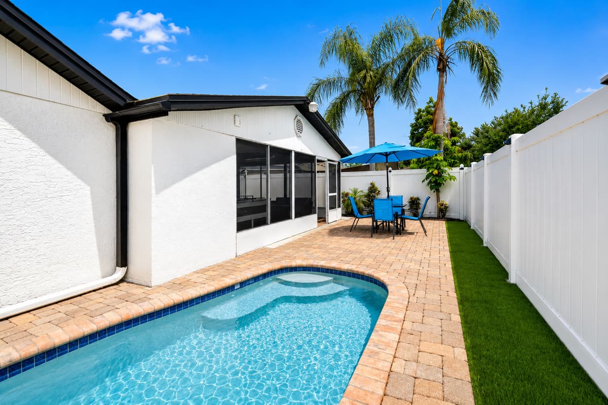 Refreshing pool area with ample space for swimming, lounging, and enjoying sunny Florida days in your own private oasis.