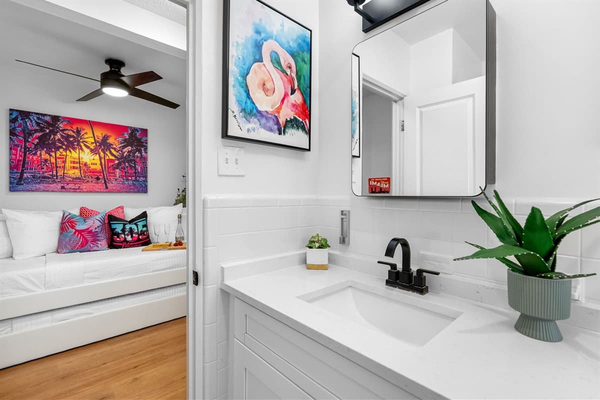 A private ensuite bathroom beckons, a sanctuary of luxury where you can pamper yourself in style.