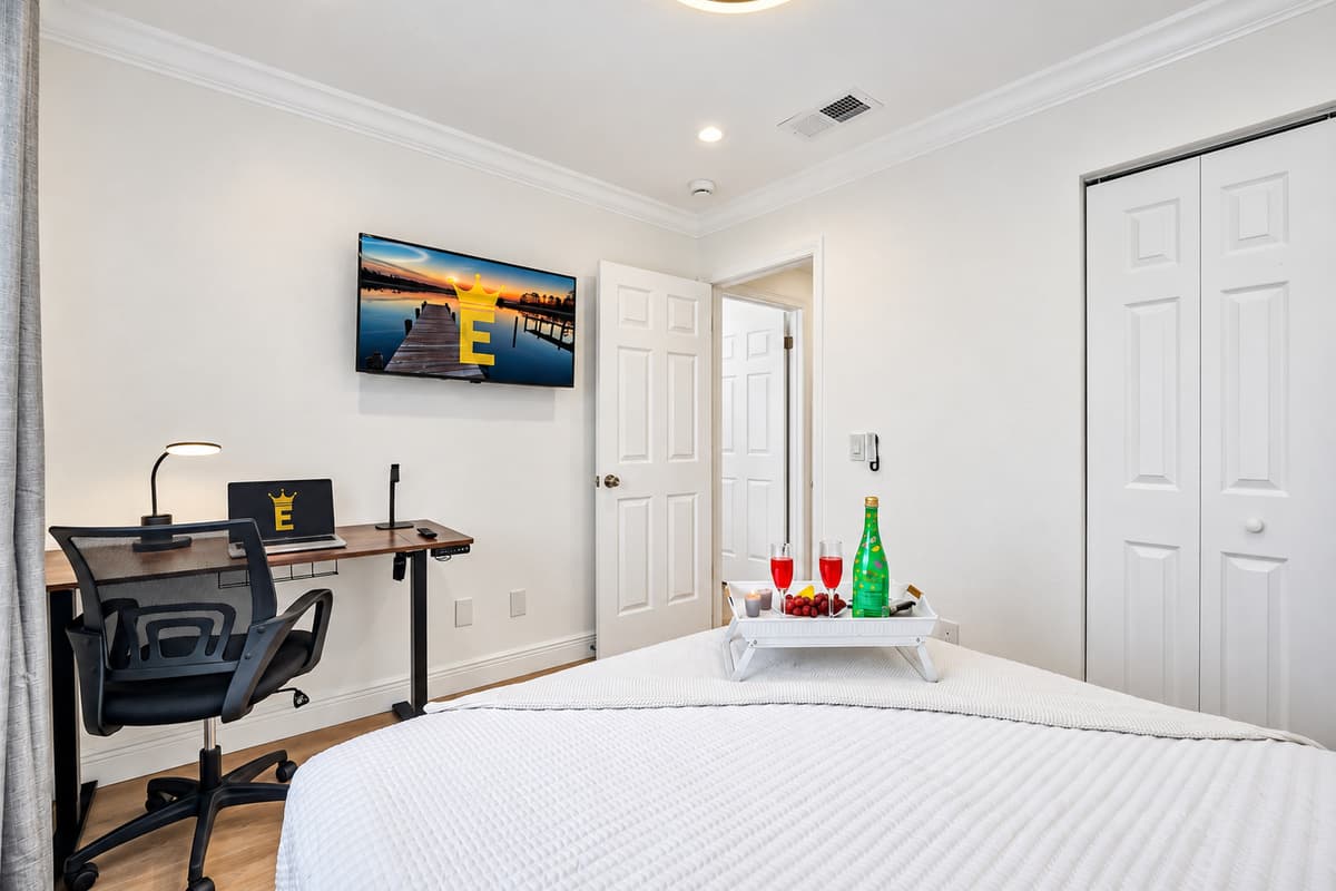 Tucked away for privacy, this bedroom offers a peaceful setting for rest, reading, or remote work.