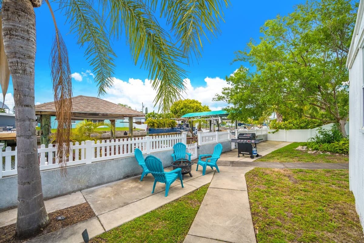 Lovely backyard with comfortable sitting area and griller. Enjoy good food while bonding with family and friends. Don't hesitate and book this property now!