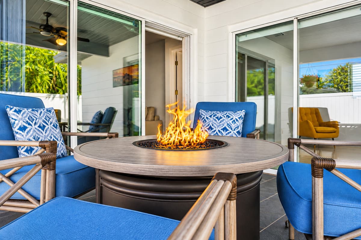 Cozy fire pit lounge area perfect for relaxing evenings and outdoor gatherings.