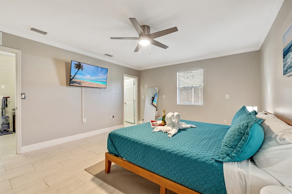 The king bed takes center stage, offering a regal and expansive sleeping space for unparalleled comfort.