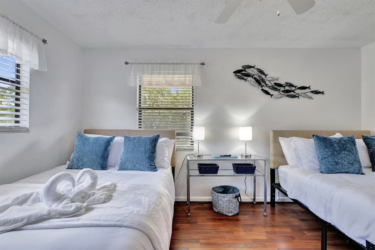 This room is designed to accommodate your needs, featuring not one, but two queen-size beds, making it ideal for families, friends, or groups traveling together.