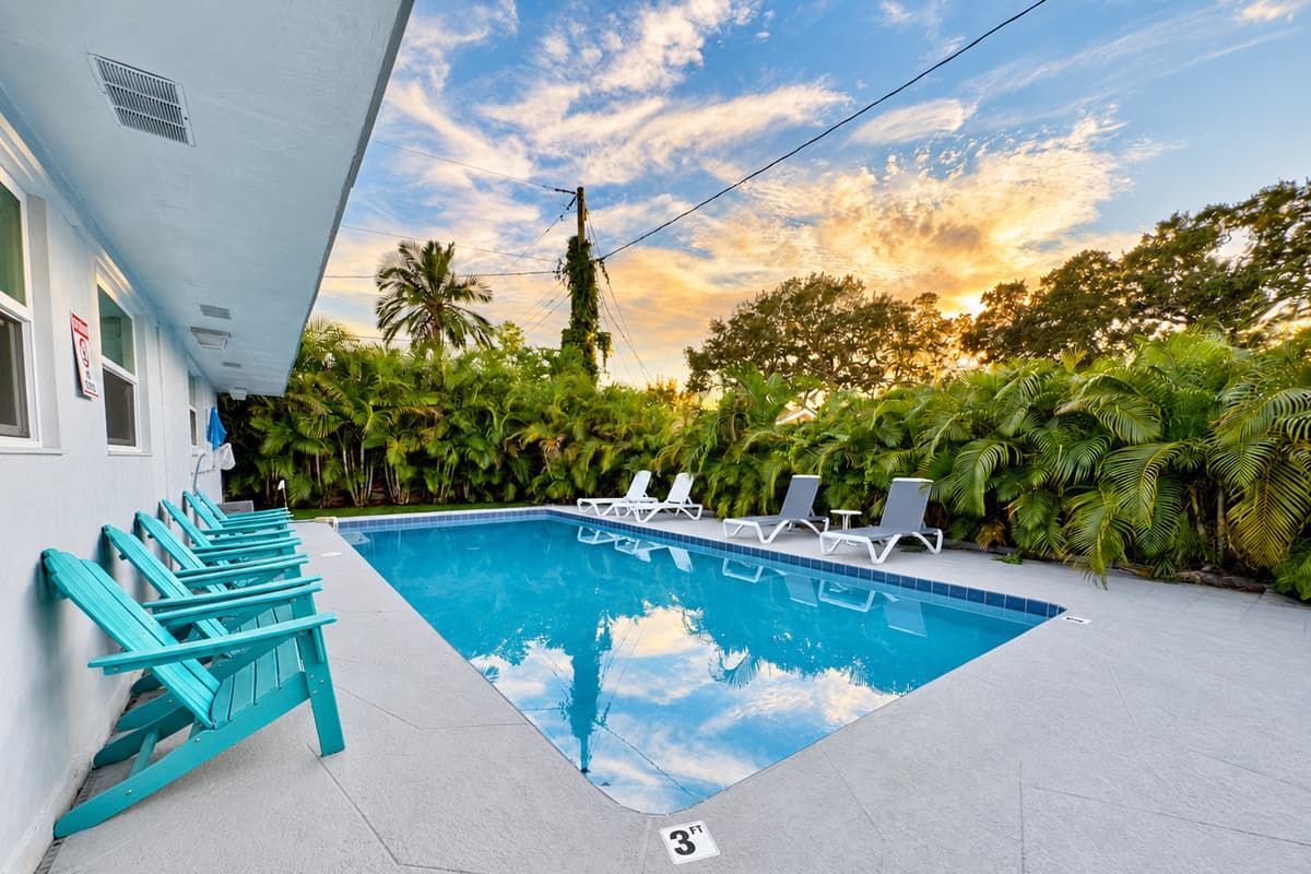 Picture yourself enjoying a poolside cocktail surrounded by lush greenery and endless sky views.