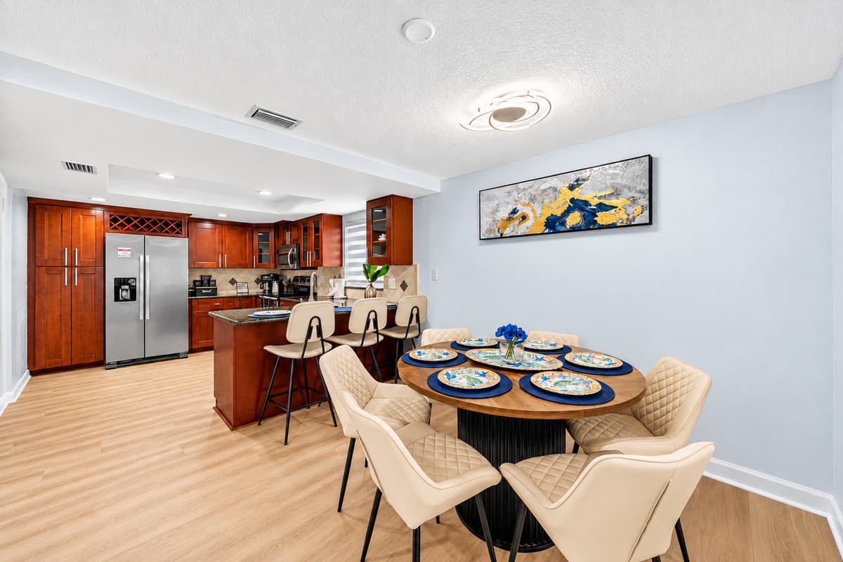 Cozy dining area with seating for six, located just steps from the kitchen and living room for easy entertaining.