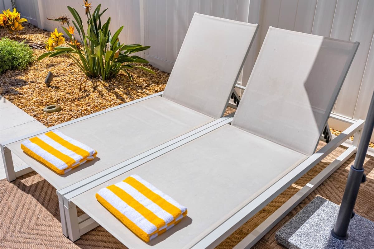 This outdoor setup is ready for pool parties, grill nights, and lazy days in the sun.