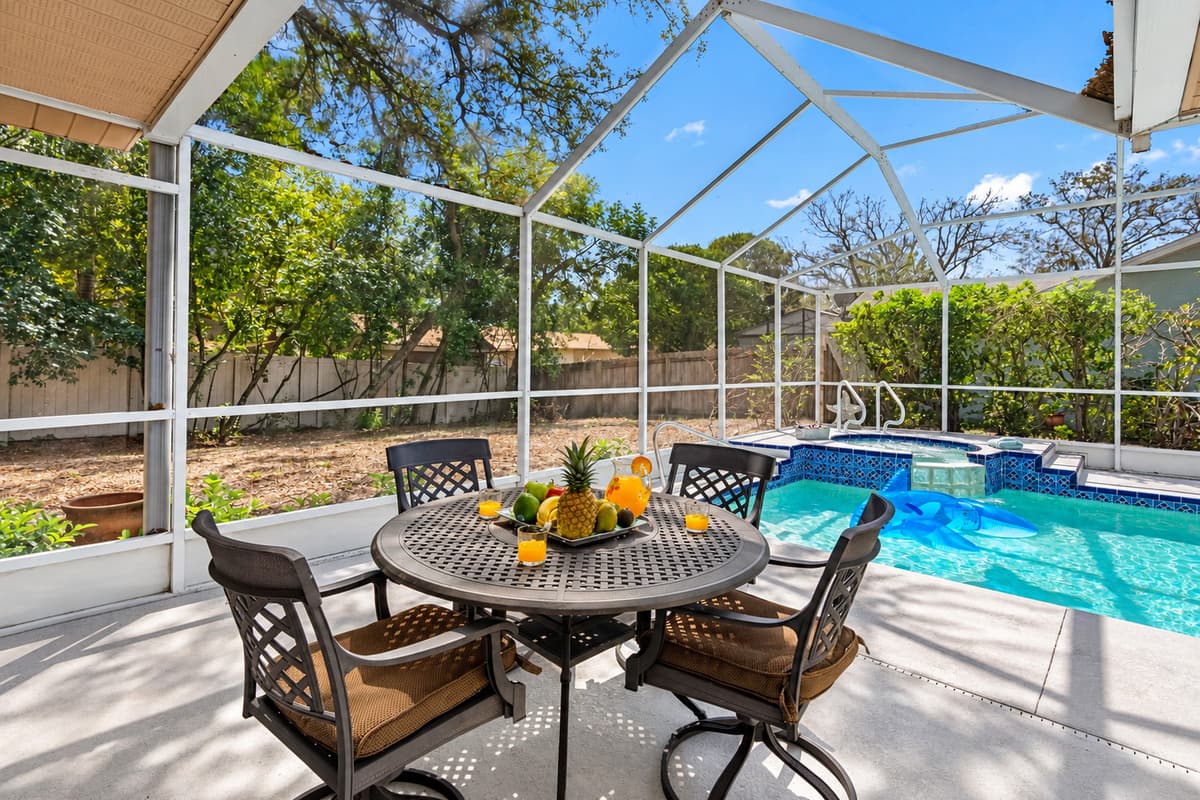 Comfortable outdoor chairs are provided for lounging, reading, or simply relaxing by the water with your favorite drink in hand.