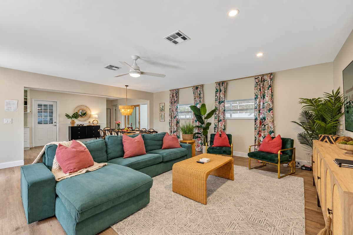 The interior design is a masterpiece of tropical chic, blending modern elegance with island-inspired elements.
