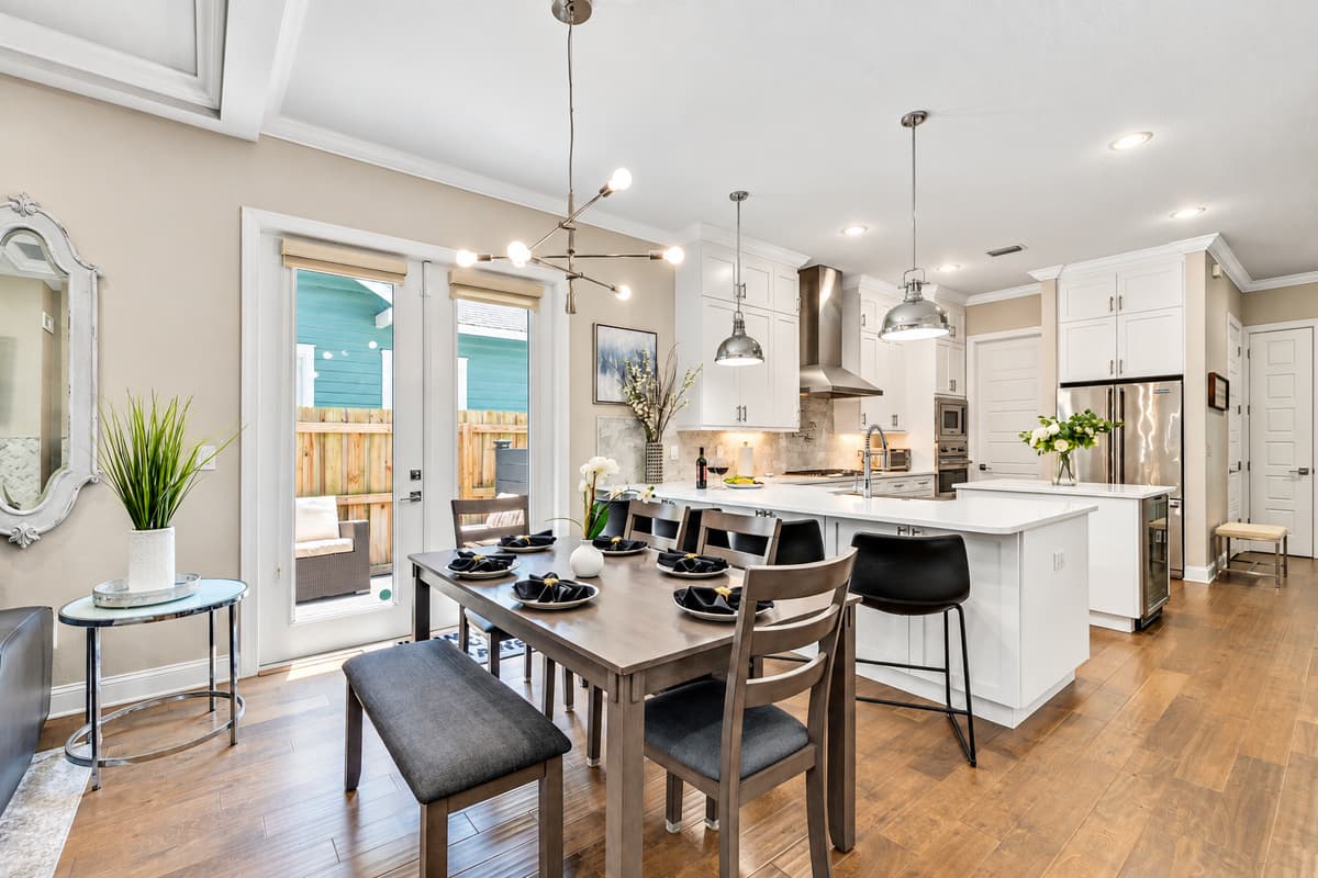 Adorned with sleek white cabinets and boasting modern appliances, this culinary haven is sure to inspire your inner chef.
